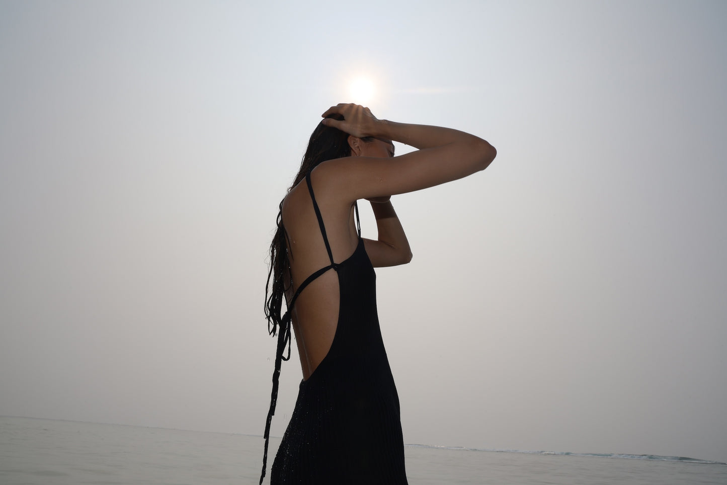 KNITTED STRAPPY MINI DRESS WITH PLEATS AT THE BOTTOM BLACK