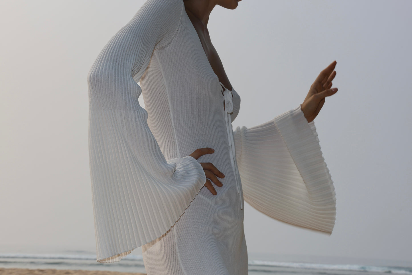 KNITTED MINI DRESS WITH WIDE PLEATED LONG SLEEVES WHITE