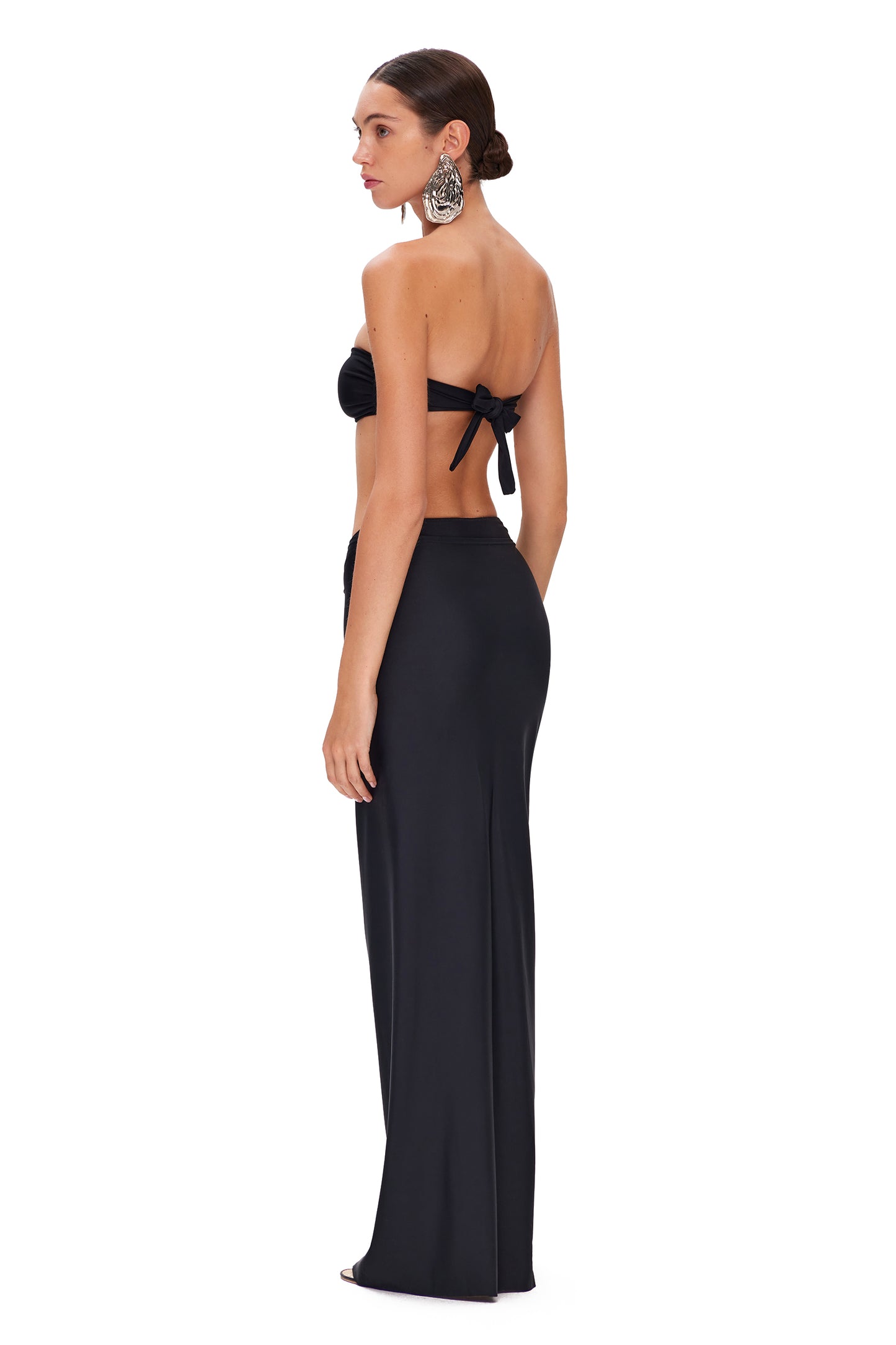 LYCRA LONG SKIRT WITH HIGH SLIT AND METAL SHELL DECOR