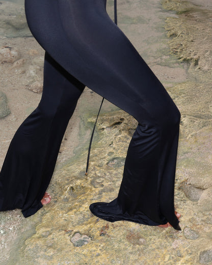 LYCRA SUIT ASYMMETRICAL TOP WITH BIG METAL HOOK DECOR AND HIGH WAIST TROUSERS BLACK