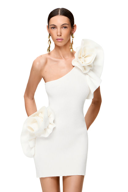 KNITTED ASYMMETRICAL MINI DRESS COUTURE WITH BIG FLOWER DECOR ON THE SHOULDER AND HIPS COLOR WHITE