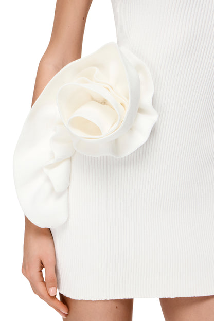 KNITTED ASYMMETRICAL MINI DRESS COUTURE WITH BIG FLOWER DECOR ON THE SHOULDER AND HIPS COLOR WHITE