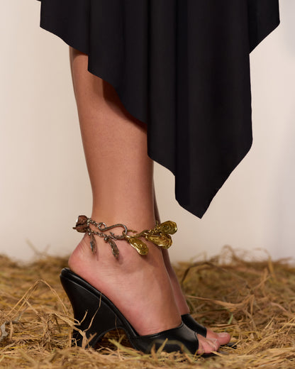 JERSEY ASYMMETRICAL SKIRT WITH SMALL METAL HOOK DECOR COLOR BLACK